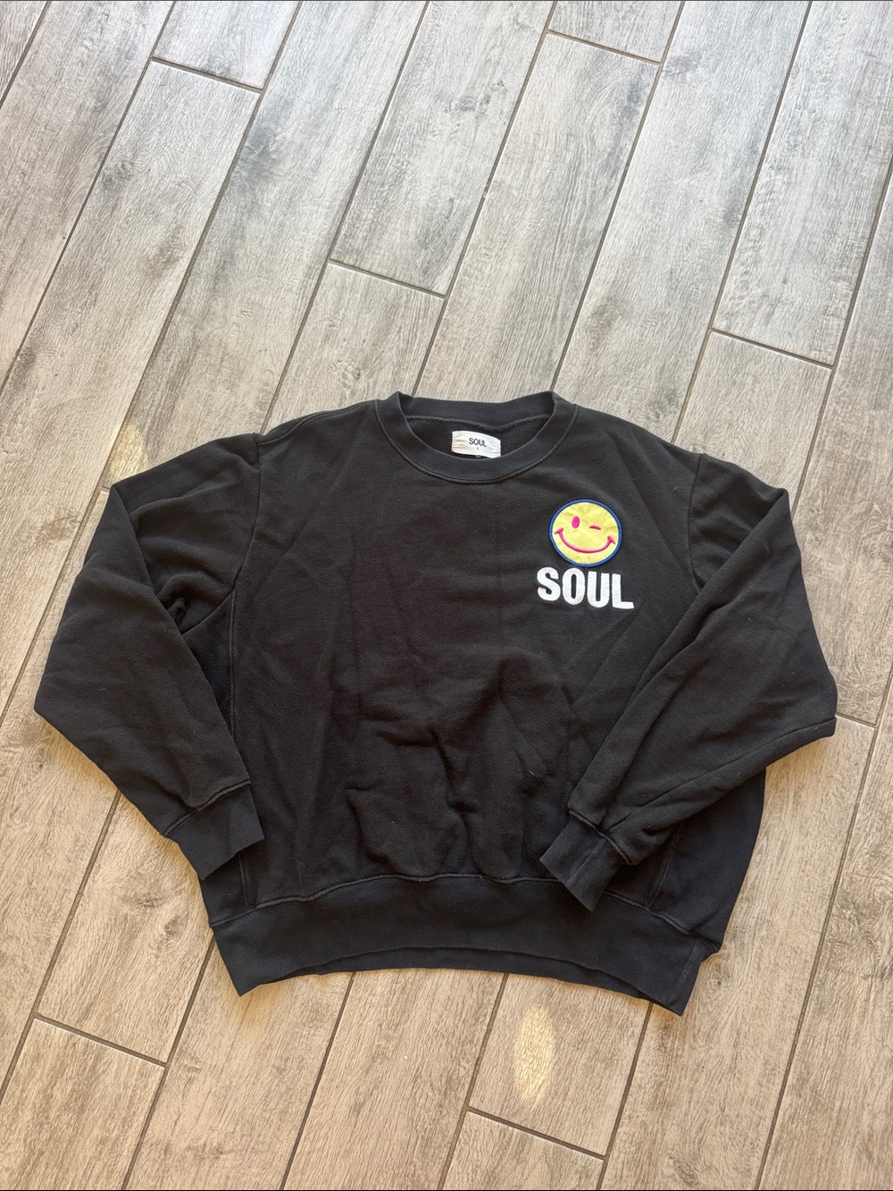 soulcycle vintage Black Crewneck Sweatshirt with Yellow Smiley Patch